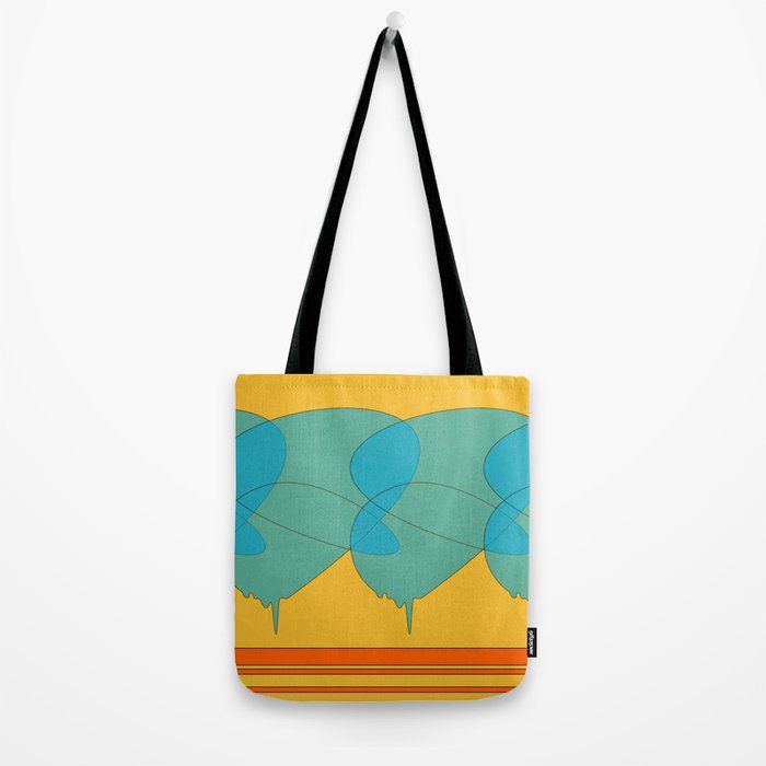 Yellow, orange, and blue abstract art print tote with black handle.