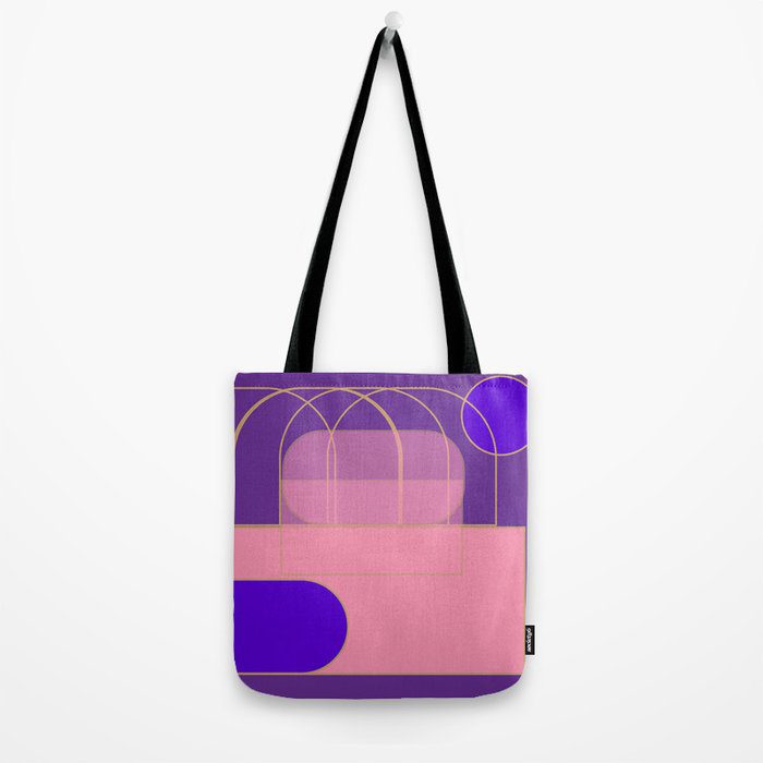 Purple and pink geometric print totebag with a black handle.