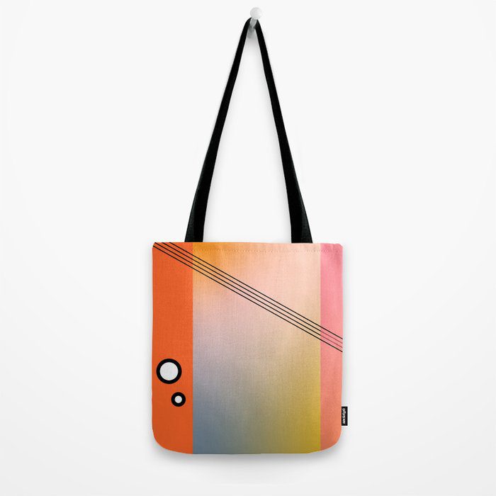 Orange and pink yellow gradient totebag with black handle.